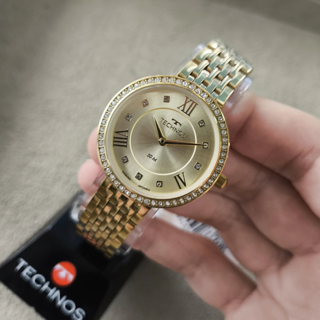 Relógio dourado feminino da marca Technos com pedrinhas